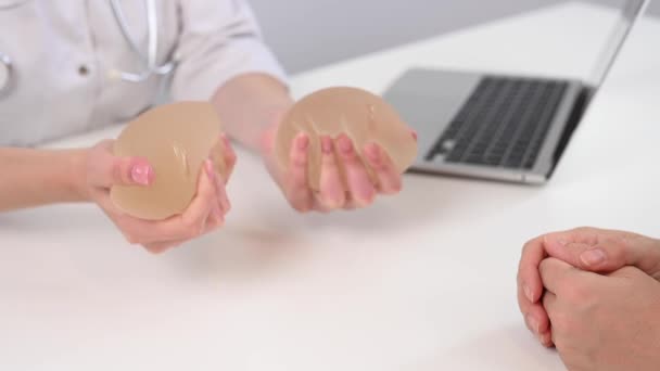 Caucasian Woman Plastic Surgeon Touching Choosing Breast Implants — Stok video