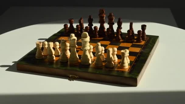 Men Playing Chess Spinning Chessboard — Stock Video