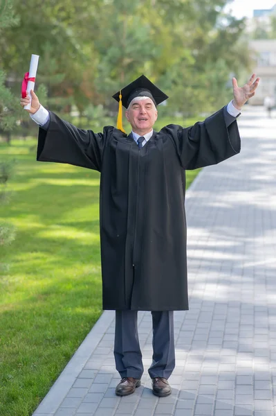Elderly Gray Haired Man Graduate Robe Spread His Arms Sides — Photo
