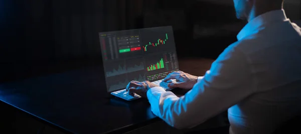 Caucasian Man Sits Dark Front Virtual Screen Stock Exchange Charts — Stock Fotó