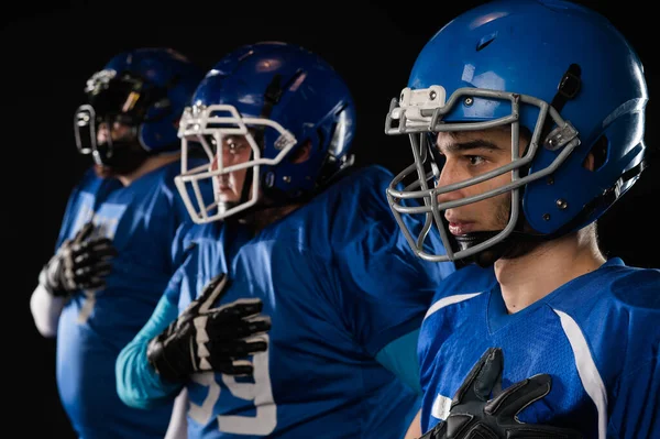 Portrait Three Men Blue Uniforms American Football Hand His Chest — стоковое фото