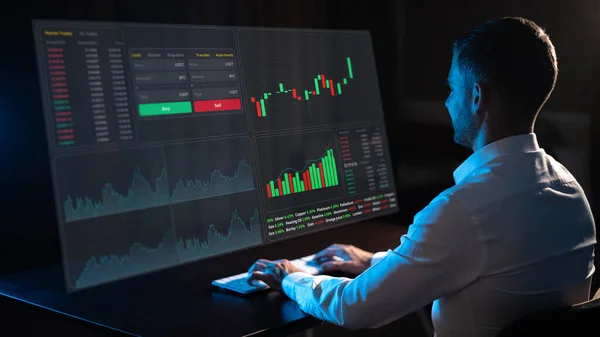Caucasian Man Sits Dark Front Virtual Screen Stock Exchange Charts —  Fotos de Stock