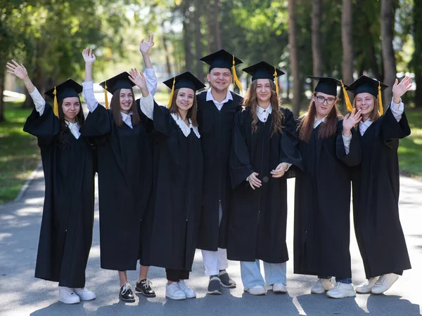 Group Happy Graduates Robes Outdoors — Stock Photo, Image