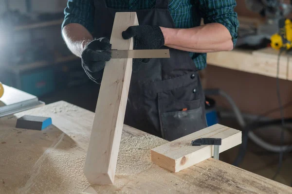 Carpenter Measures Wooden Board While Working Workshop — Stock Photo, Image