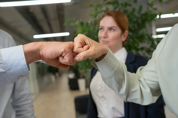 Caucasian Man Bumping His Fists Colleagues Sign Success — 图库照片