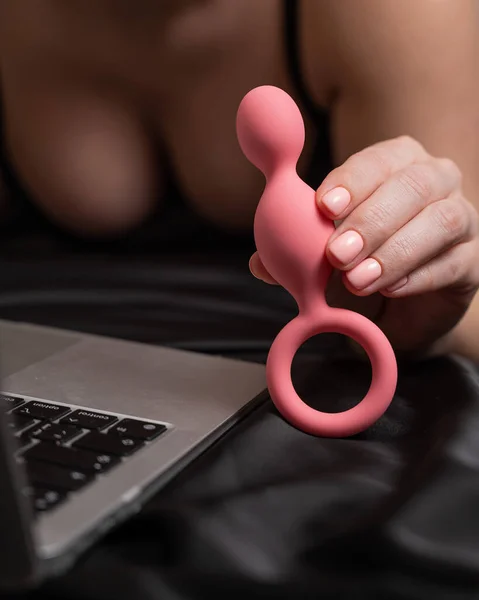 Woman Holding Pink Anal Beads Next Laptop While Lying Black — Stock Photo, Image