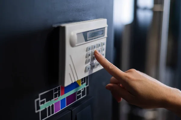 stock image Floor plan and switching lighting. The woman pressed the button