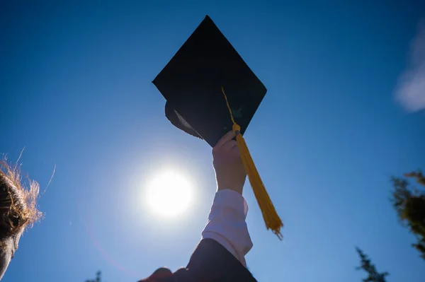 Close Womans Hand Graduation Cap Blue Sky — Stock Photo, Image