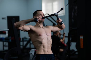 Man Thrust of the upper block to the chest in the gym
