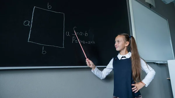Schoolgirl Answers Lesson Caucasian Girl Writes Formula Blackboard — Stock Photo, Image