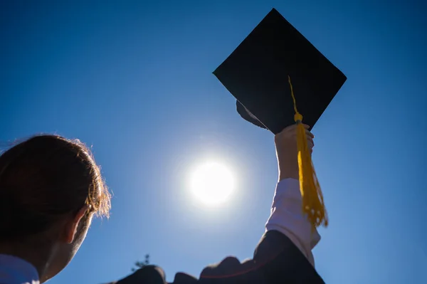 Woman Throws Her Graduation Cap Blue Sky — Stock Photo, Image