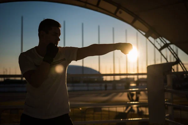 Man Trains Boxing Stadium Sunset Athlete Silhouette — Stock Fotó