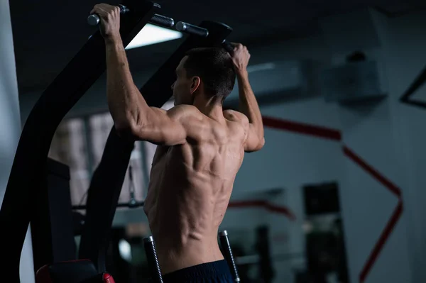 Back View Shirtless Man Pull Ups Gym — Foto de Stock