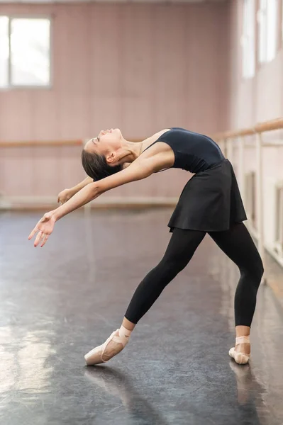Asian Woman Doing Back Flexibility Exercises Ballet Barre — Zdjęcie stockowe