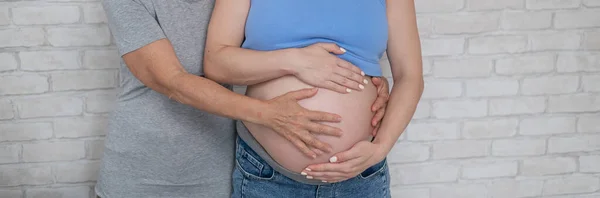 Elderly Woman Touches Belly Her Pregnant Daughter Close Widescreen — Stock Photo, Image