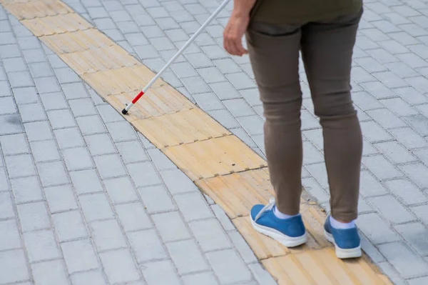 Close Legs Elderly Blind Woman Cane Tactile Tile — Stock Photo, Image