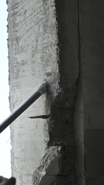 Builder Drills Concrete Wall Construction Site Slow Motion Vertical Video — Stock Video