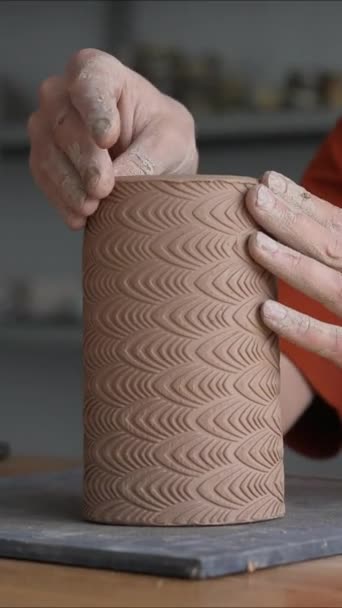 Close Mans Hands Making Patterned Cylinder Out Clay Vertical Video — Stock Video