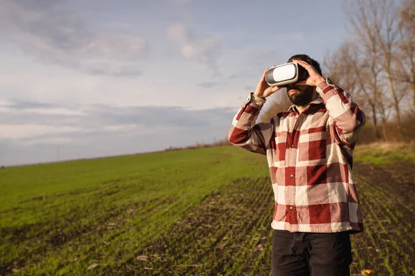 Young Man Standing Wheat Field Sunset Virtual Reality Glasses Stock Photo
