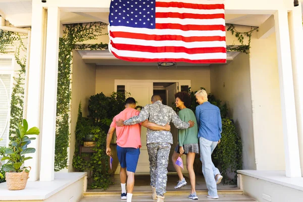Happy Diverse Group Friends Greeting Biracial Male American Soldier House — Stock Photo, Image