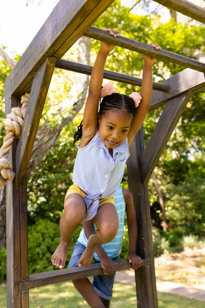Low Angle View African American Girl Hanging Monkeys Bars Playground — Stock Photo, Image