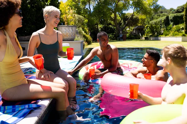 Happy Diverse Group Friends Having Pool Party Holding Plastic Cups — Stock Photo, Image