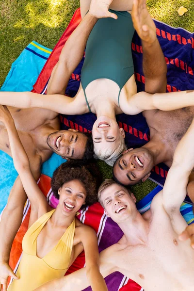 Portrait Happy Diverse Group Friends Lying Towels Smiling Garden Lifestyle — Stock Photo, Image