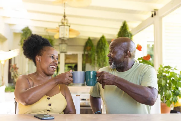 Happy Senior African American Couple Drinking Coffee Smartphone Table Senior — Stock Photo, Image