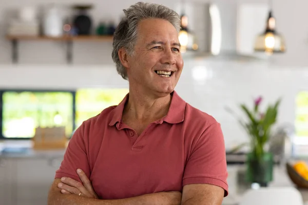 Smiling Caucasian Senior Man Arms Crossed Looking Away While Standing — Stock Photo, Image