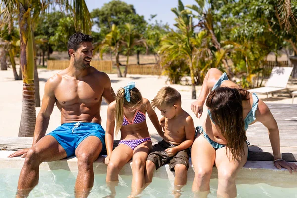 Happy Biracial Family Sitting Swimming Pool Spending Quality Time Lifestyle — Stock Photo, Image