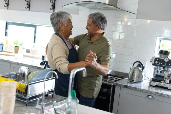 Side View Biracial Senior Couple Holding Hands Looking Each Other — Stock Photo, Image