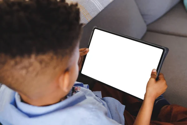 African American Boy Sitting Sofa Using Tablet Copy Space Living — Stock Photo, Image