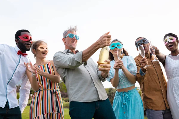 Felices Amigos Diversos Con Botella Champán Durante Boda Día Boda —  Fotos de Stock