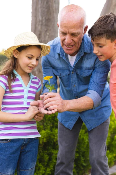 Vertical Picture Caucasian Children Grandfather Spending Time Together Garden Family — Stock Photo, Image