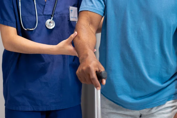 Midsection Diverse Female Doctor Helping Senior Male Patient Use Walking — Stock Photo, Image