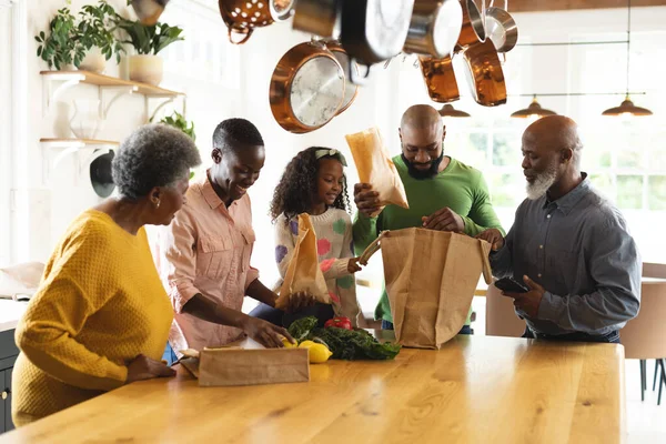 Image Happy African American Multi Generation Family Unpacking Shopping Bags — Stock Photo, Image