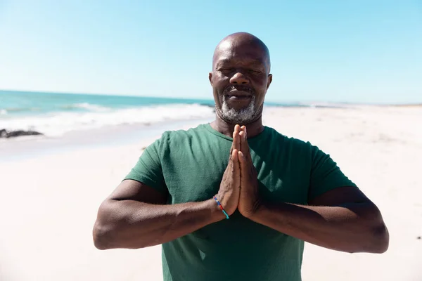 African American Bald Senior Man Eyes Closed Meditating Prayer Position — Stock Photo, Image