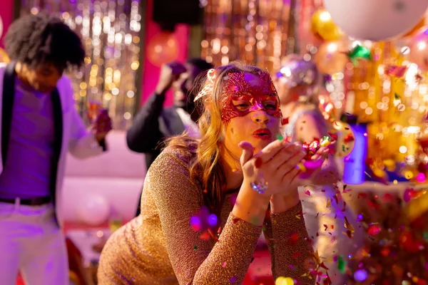 Happy Caucasian Woman Mask Blowing Glitter Dancefloor Party Nightclub Fun — Stock Photo, Image