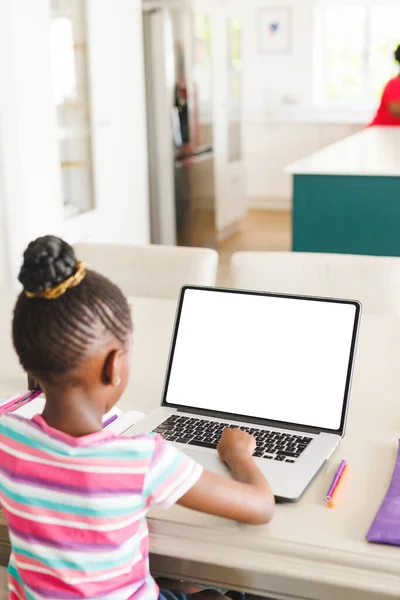 Rear View African American Girl Hair Bun Using Laptop While — Stock Photo, Image