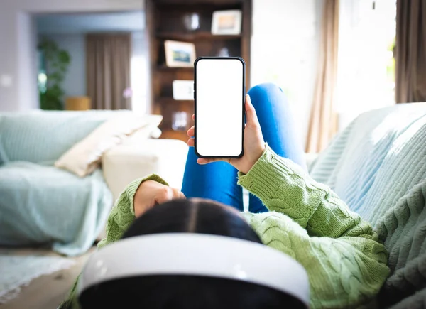 Image Woman Lying Sofa Holding Smartphone Blank Screen Copy Space — Stock Photo, Image