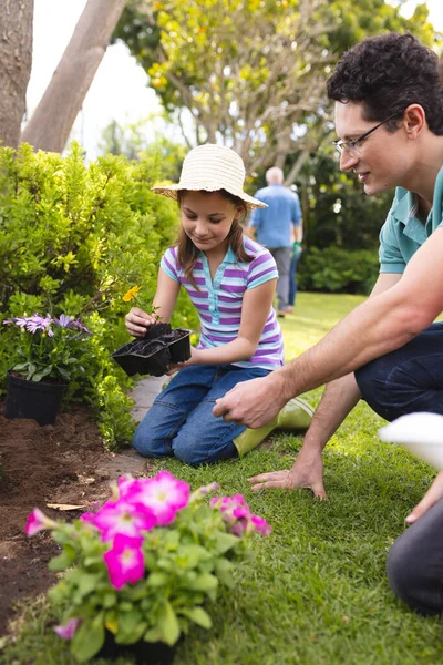 Vertical Picture Caucasian Family Spending Time Together Garden Planting Family — Stock Photo, Image
