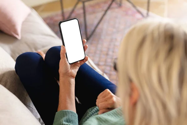 Senior Caucasian Woman Sitting Sofa Living Room Using Smartphone Copy — Stock Photo, Image