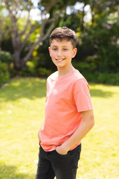 Portrait Young Boy Wearing Orange Shirt Standing Garden Spending Time — Fotografia de Stock