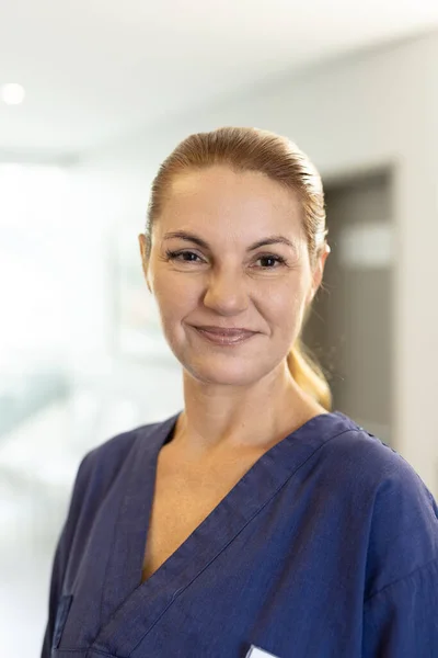 Vertical Portrait Smiling Caucasian Female Healthcare Worker Corridor Copy Space — Stock Photo, Image