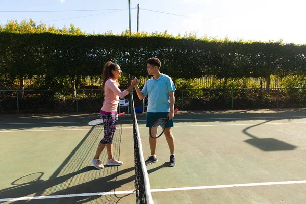 Smiling Biracial Couple Playing Tennis Shaking Hands Net Sunny Outdoor — Stock Photo, Image