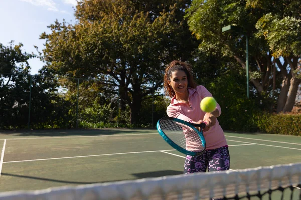 Biracial Woman Playing Tennis Returning Ball Net Sunny Outdoor Tennis — Stock Photo, Image