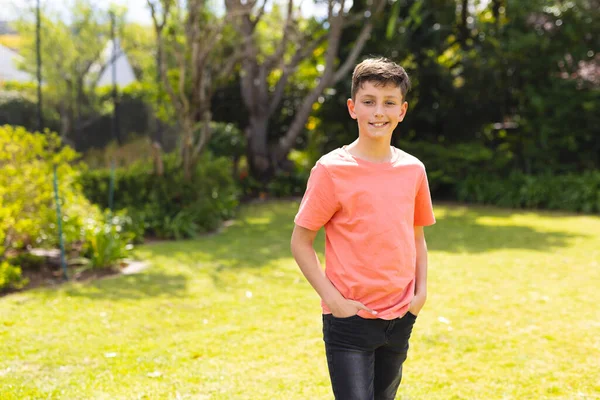Portrait Young Boy Wearing Orange Shirt Standing Garden Spending Time — Foto Stock