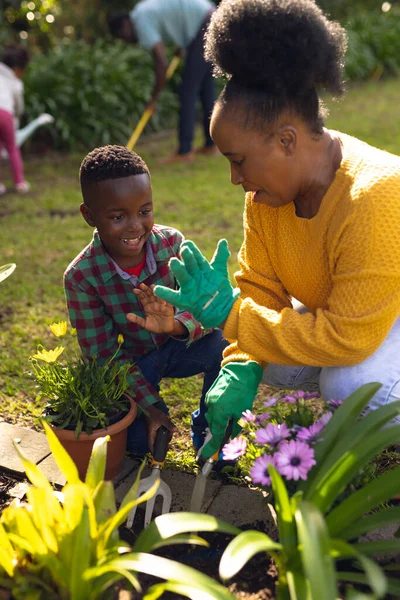 Vertical Picture African American Mother Son Spending Time Together Garden — Stock Photo, Image