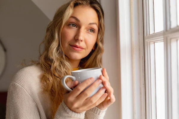 Happy Caucasian Woman Holding Mug Standing Next Window Smiling Spending — Stock Photo, Image
