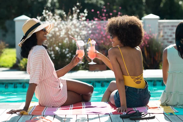 Stylish Biracial Young Females Toasting Cocktails While Having Fun Pool — Stock Photo, Image